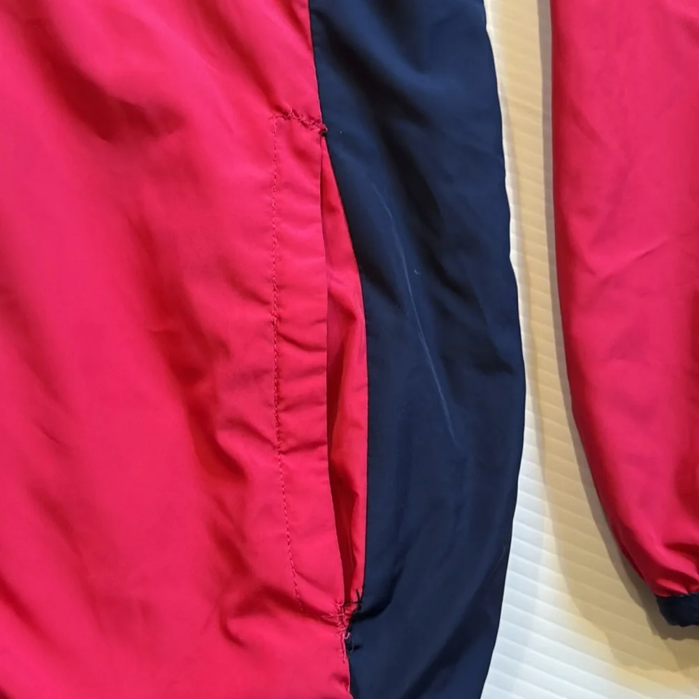 Eddie Bauer pink & blue, flowered reversible hooded jacket.  Girls size large